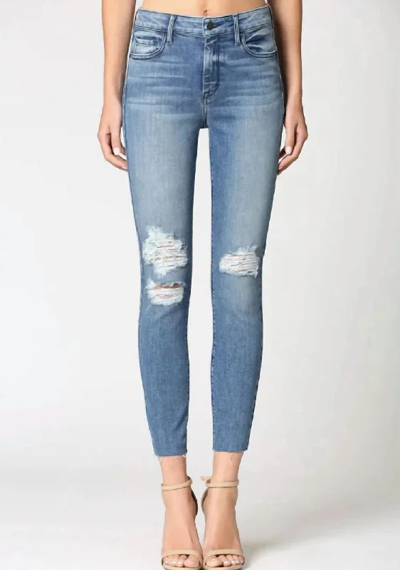 ladies' dark wash denim jeans -Renee Ripped Skinny Jeans In Medium Blue